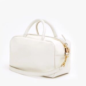 Clare V. Petit Claude